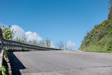 country road through hilly landscape