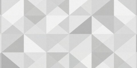 Abstract grayscale geometric pattern of repeating triangles forming a three-dimensional textured surface
