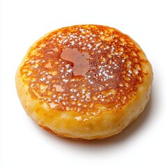 A golden-brown pancake topped with syrup and powdered sugar, showcasing a delicious breakfast treat.