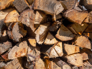 Firewood in the firewood stove creates coziness and warmth, filling the house with an atmosphere of comfort and disposing to family gatherings.