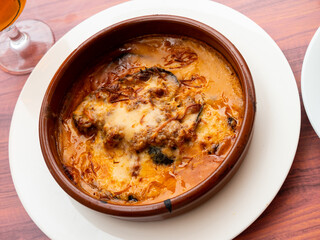 Just prepared appetizing moussaka with beef served on table.