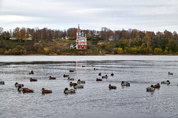 Russia. The town of Tutayev. View across the Volga from the embankment near the Resurrection Cathedral. The Kazan Transfiguration Church