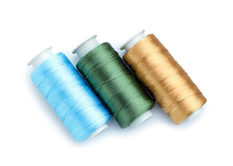 Spools of bright sewing threads isolated on white, top view