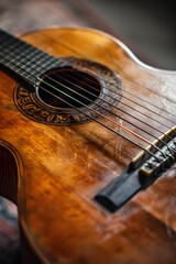 Fototapeta premium Intricate Detailing and Unique Design of a Glossy Round-back Acoustic Guitar