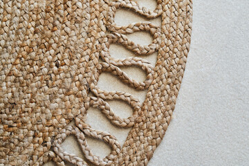 Close-up of a braided jute rug with intricate woven design