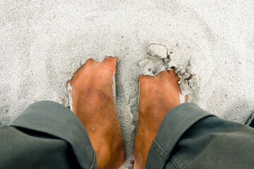 Bare Feet in Warm Sand at A Beach in South Lampung