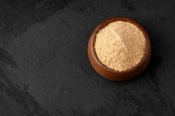 Organic peruvian maca powder in the bowl - Lepidium meyenii
