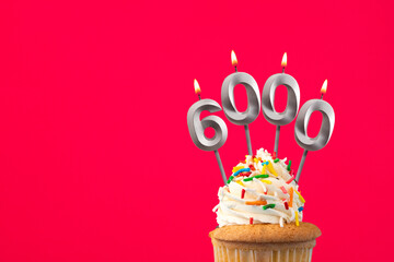 Number of followers or likes - Candle number 6000
