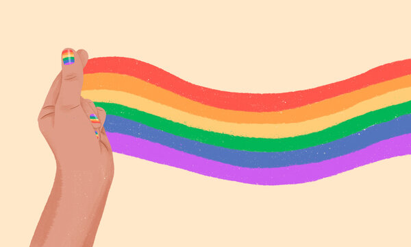 Hand with rainbow nail art creating vibrant pride flag wave