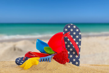 Set of beach toys and accessories for children on sand