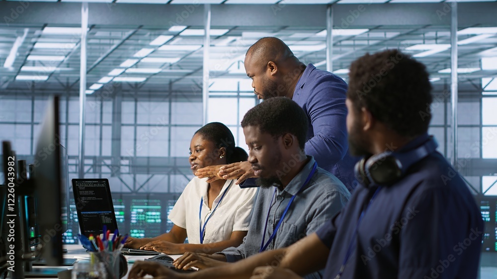Poster data center team leader supervising engineers implementing ai predictive maintenance systems. server