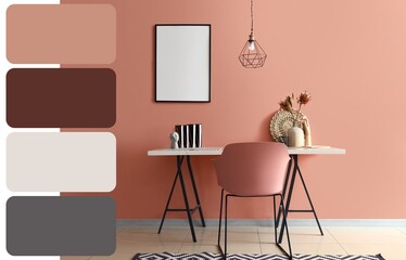 Interior of room with workplace near coral wall. Different color patterns