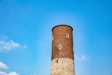 A Historic Tower Standing Majestically Against a Clear Blue Sky with Wonderful Scenery