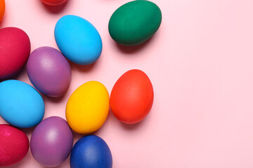 Colorful Easter eggs on pink background