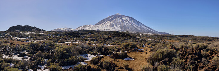 Majestic Teide Volcanic Landscape with Snow Capped Mountain Peak