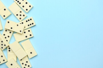 White dominos blocks on blue background