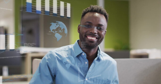 Image of data processing and diagrams over biracial businessman smiling in office - Powered by Adobe