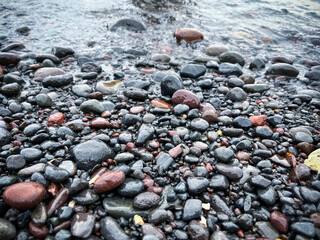 pebble beach and wave on the black sea, natural background