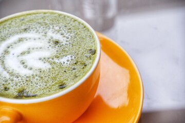 Matcha latte combines the vibrant flavors Of green tea and creaminess