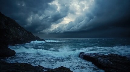 Obraz premium Dramatic coastal storm; ocean waves crashing; dark clouds; rocky shore; nature backdrop