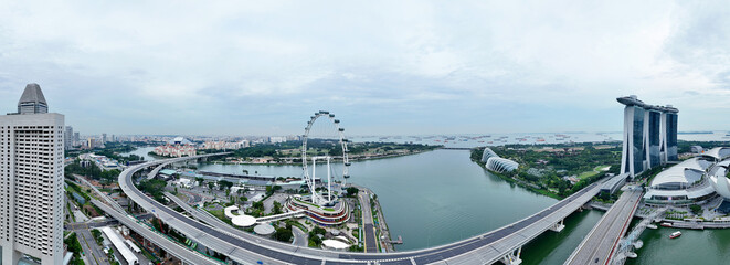 Panoramic aerial view of Singapore iconic skyline city, urban landscape lush greenery and the...