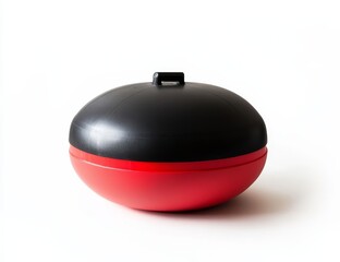 Fototapeta premium Red and black plastic container with a lid and handle.