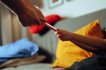 Girl and her Father Fighting Over a Mobile Phone at Home. Kid protesting her punishment of no...