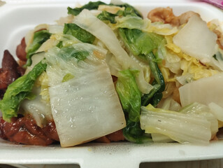 mixed vegetable rice meal served in a white Styrofoam lunch box