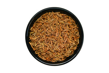 Cumin seeds in a black bowl isolated on a transparent background.