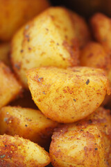 Crispy golden roasted potatoes garnished with spices