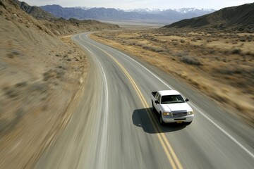 Car Driving on Winding Road through Scenic Mountain Landscape