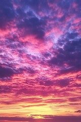 Fototapeta premium Dramatic sky with pink and purple clouds at sunset creating a vibrant colorful scene