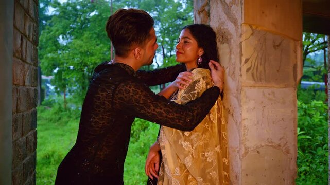 Lovers stands closely romancing at abandoned spot