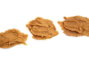 Japanese miso paste on white background.