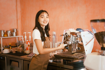 A beautiful young woman barista smiling warmly while making fresh coffee in a cozy café, creating a welcoming atmosphere and serving customers with skill and charm in a modern coffee shop