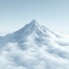 Majestic snow capped mountain peak rising above a sea of fluffy clouds under a clear blue sky