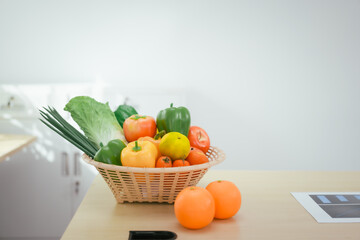 A desk with a fruit basket symbolizes a nutritionist's workspace, promoting healthy eating, balanced diets,wellness through the presentation of fresh fruits organized tools for nutritional planning