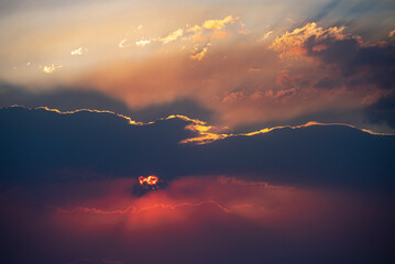 Sun dramatic light. Sunset sky dramatic sunset clouds and sunset sunrays. Beautiful colorful dramatic sky with clouds at sunset or sunrise. Sun rays. Skyscape nature composition. Natural sky.