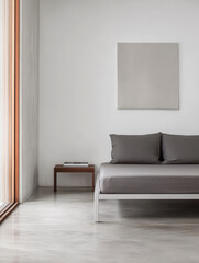 Modern minimalist living room with gray sofa and natural light from large windows