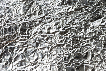 Abstract crumpled silver paper texture background, blank wrinkle paper pattern background