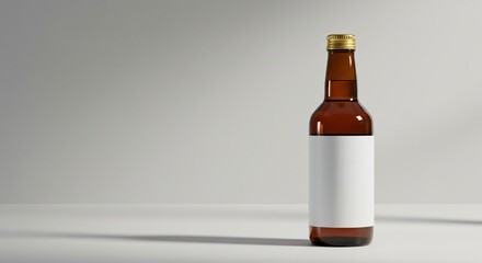 A brown glass bottle with a blank white label and a gold cap stands on a neutral surface, illuminated by soft lighting, creating a clean and minimalistic aesthetic.
