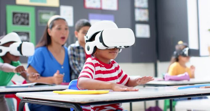 In school, children using VR headsets for interactive learning in classroom