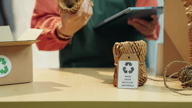 Eco-friendly product packaging concept featuring recyclable materials. Close-up of items with recycled tags and sustainable wrapping. Recyclable packaging, sustainable materials, eco-friendly products