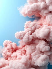 Soft pink clouds floating in a bright blue sky