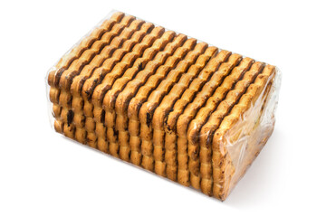 Transparent packaging of rectangular biscuits on a white background. Close-up of a pack of cookies.