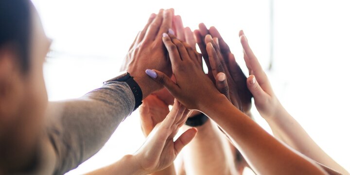 Diverse group of hands, teamwork, unity. Hands of different ethnicities, collaboration, support. Teamwork, unity, diverse hands reaching together. Diverse hands from people teamwork image.
