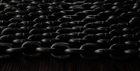 Obraz premium Heavy iron chain. Background of several thick iron chains laid out evenly.