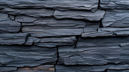 Obraz premium Dark gray slate stone wall texture background