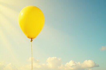Yellow balloon tied to a pole with a long string unwinding from it, , relax