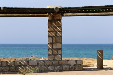 sunshade in city park on the seashore